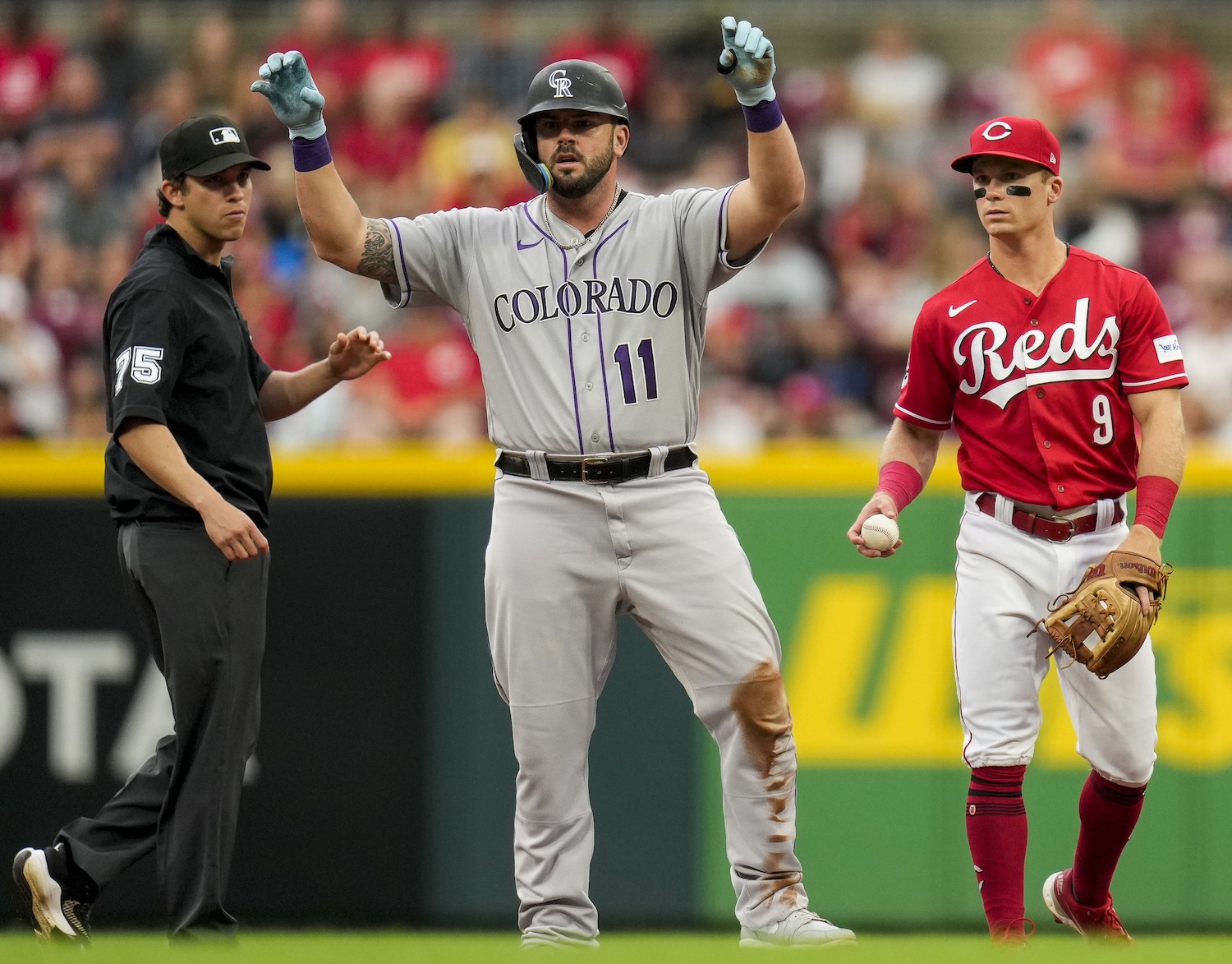 Colorado Rockies first baseman Mike Moustakas celebrates after